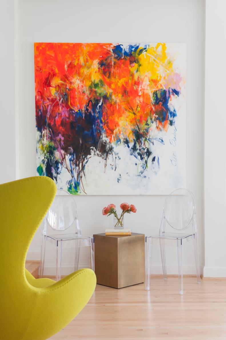 Modern White Sitting Area with Large Multicolor Painting 
