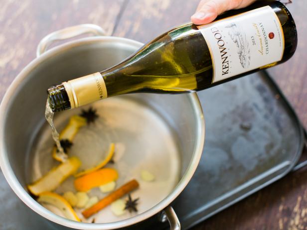 Remove saucepan from heat, then add wine  and let stand for 20 minutes.
