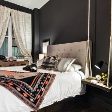 Black Master Bedroom with Room Saving Furnishings
