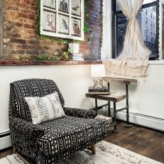 Sitting Area with Exposed Brick in Small Apartment