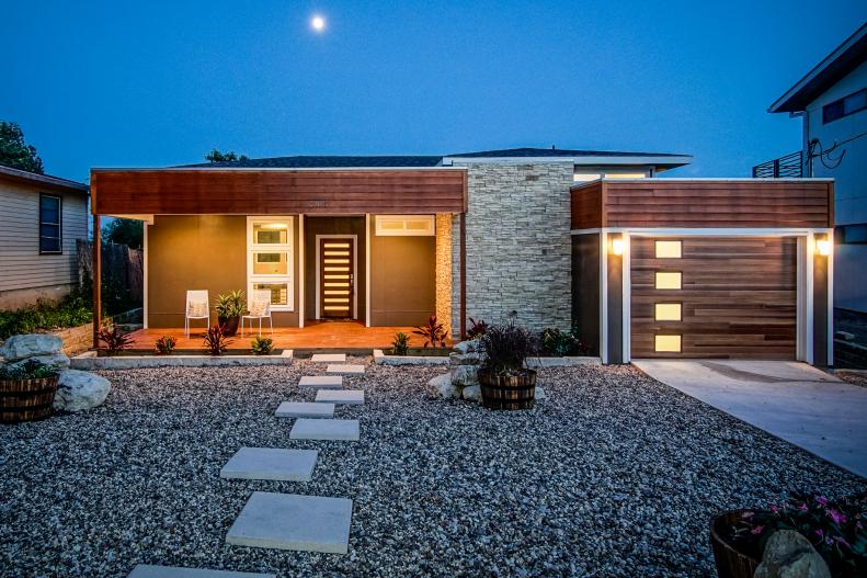 Contemporary Gray and Brown Home Exterior With Pebble Front Yard