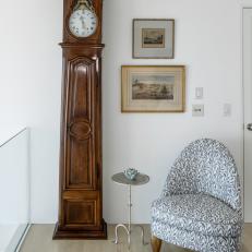 Beach House Sitting Area Featuring Grandfather Clock and Contemporary Chair