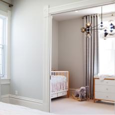 Small Modern Nursery off Master Bedroom
