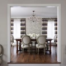 Gray and White Dining Room with Wallpapered Walls to Complement China Pattern