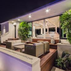 Contemporary Wood Deck With Light Wicker Outdoor Furniture