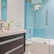White Bathroom With Blue Glass Tile Backsplash