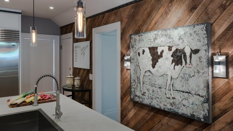 Rustic Wood-Paneled Wall With Cow Artwork