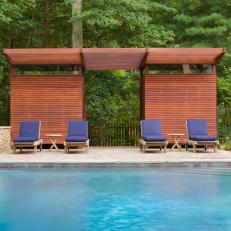 Serene Pool Deck with Contemporary Wood Cabanas 