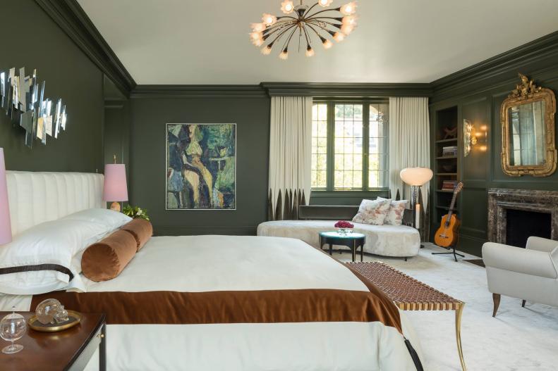 Hunter Green Bedroom With Cream Accents and Sitting Area