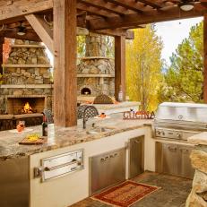 Pergola Offers Shade to Rustic Outdoor Kitchen