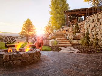 Rustic Stone Fire Pit on Paver Patio