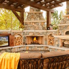 Outdoor Living Space Boasts TV, Fireplace and Pizza Oven
