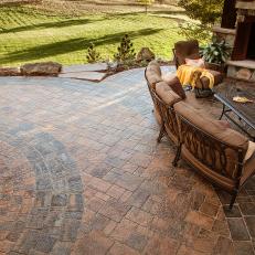 Rustic Paver Patio With Curved Outdoor Sofa
