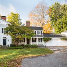 White Colonial Home on Wooded Lot