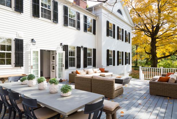 White Colonial Home Exterior With Back Deck for Outdoor Living