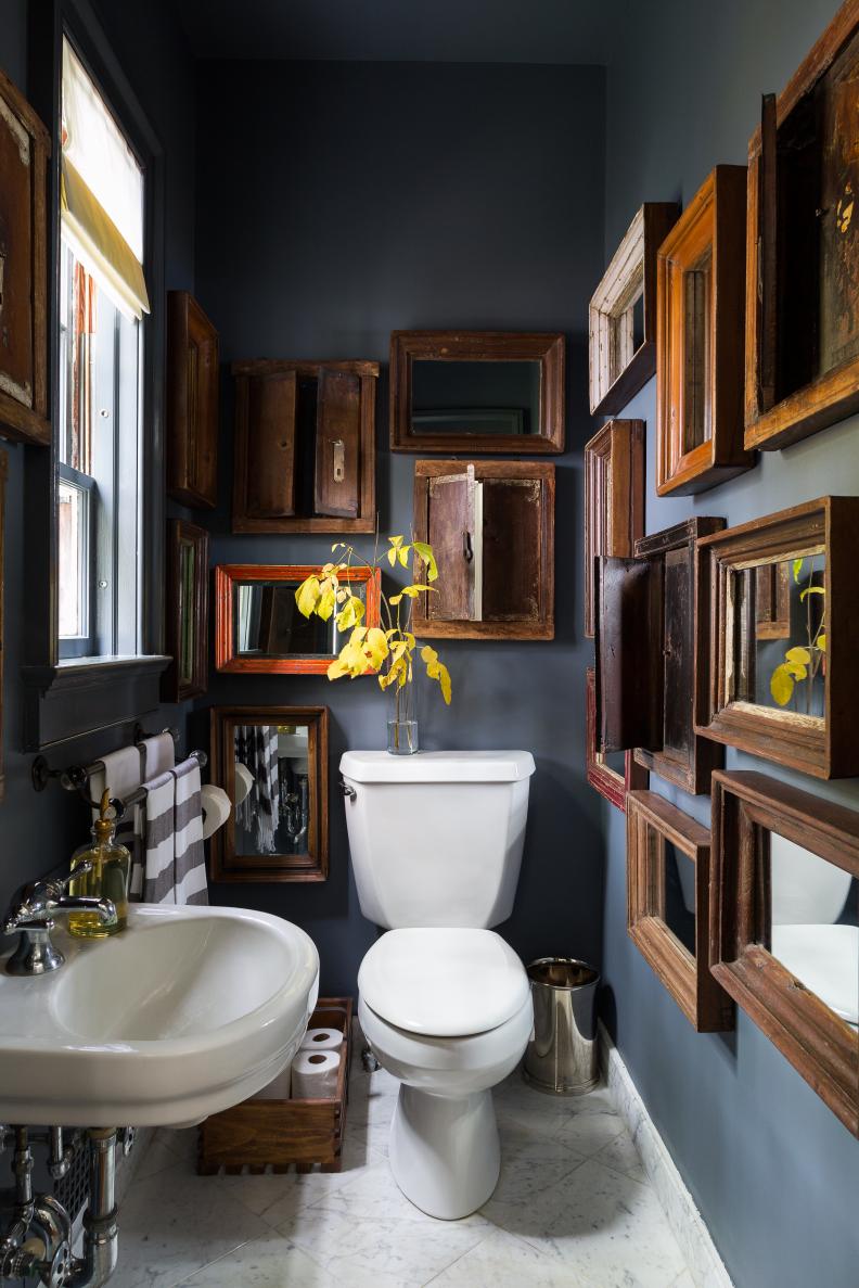 Winter-Inspired Dark Gray Powder Room With Framed Mirrors