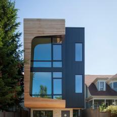 Modern Home Exterior Boasts Artistic Wood Frame