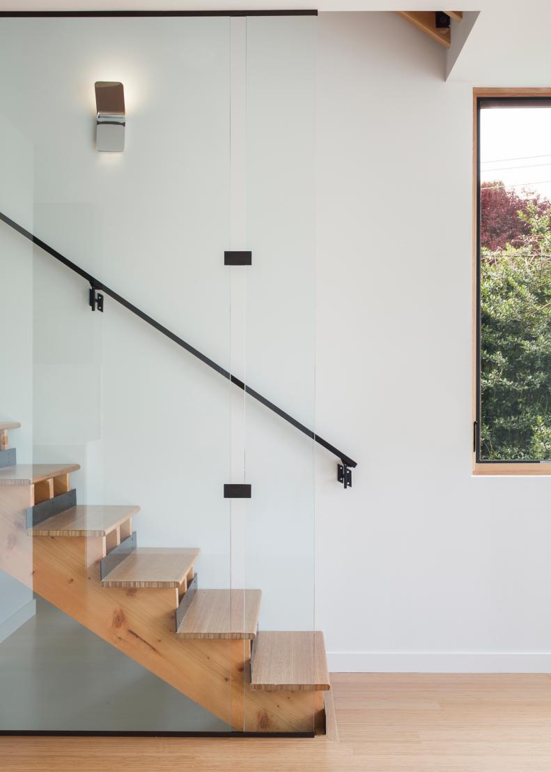 Modern Wood Staircase With Black Handrail