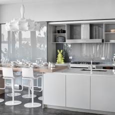 White Modern Kitchen With Concrete Floor