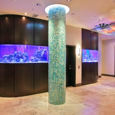Contemporary Foyer With Built-In Fish Tanks and Mosaic Tile Columns 