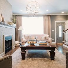 Neutral Transitional Living Room With Globe Chandelier