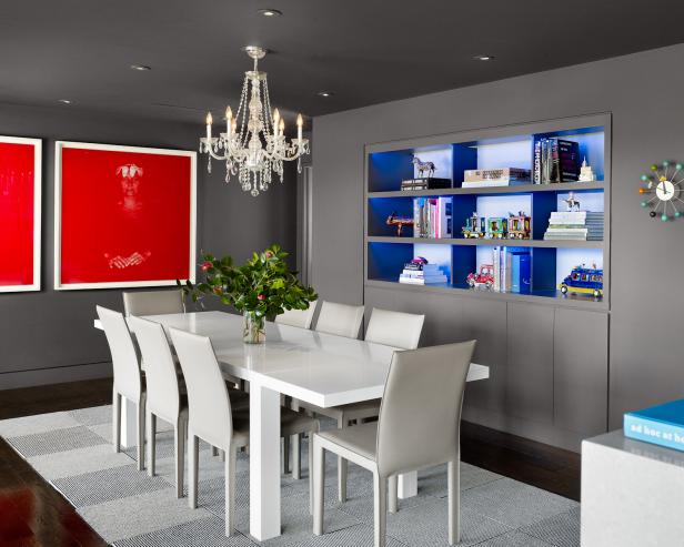 Modern Gray Dining Room With White Dining Table and Red Artwork