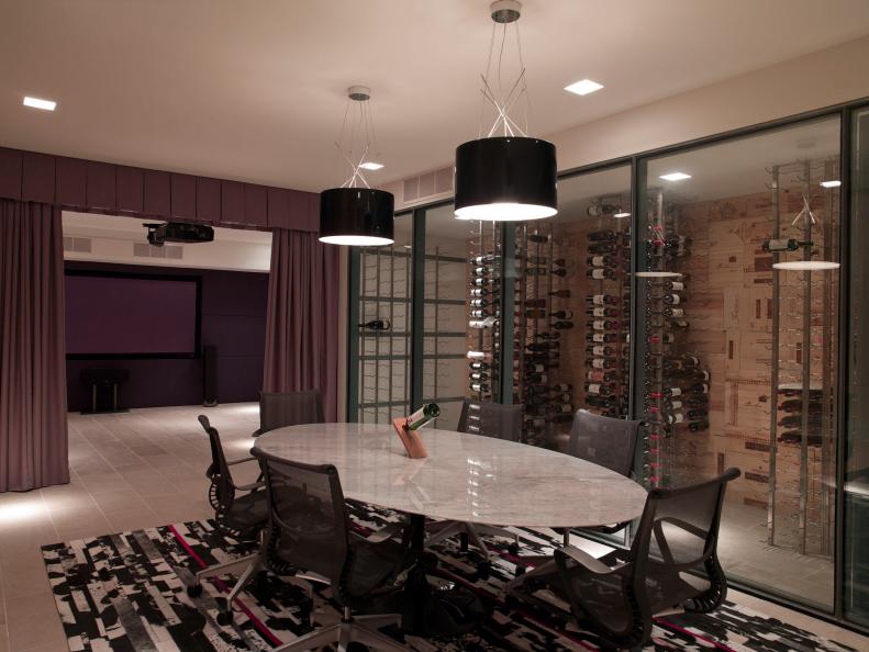 Modern Dining Room With Marble Dining Table and Black Pendant Lights