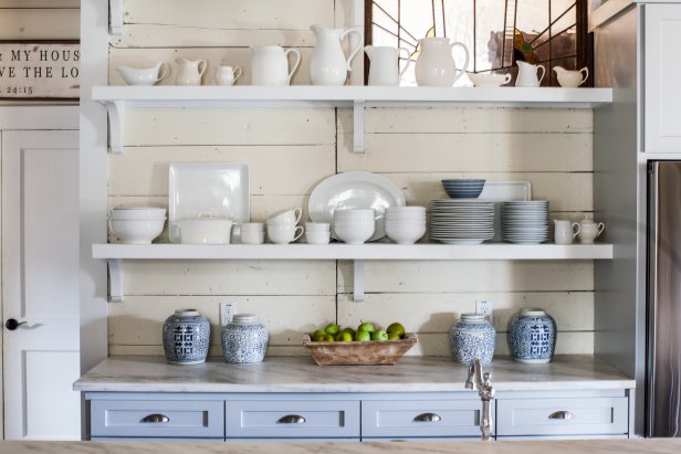 White Shelves Displaying White Dishes in Country Kitchen