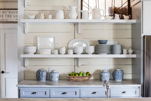 White Shelves Displaying White Dishes in Country Kitchen