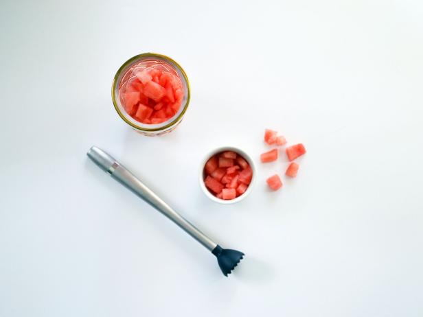 Watermelon in Cocktail Shaker With Muddler