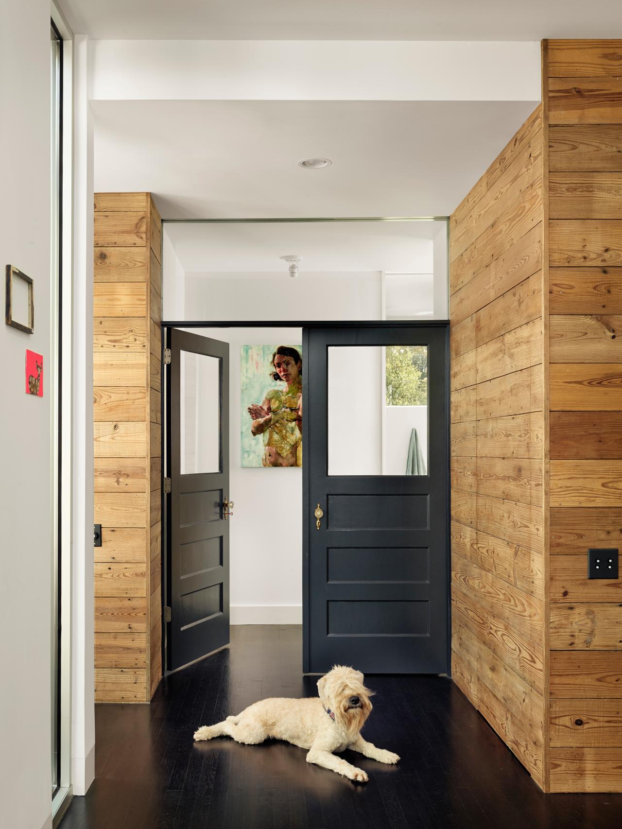 black interior doors with wood trim