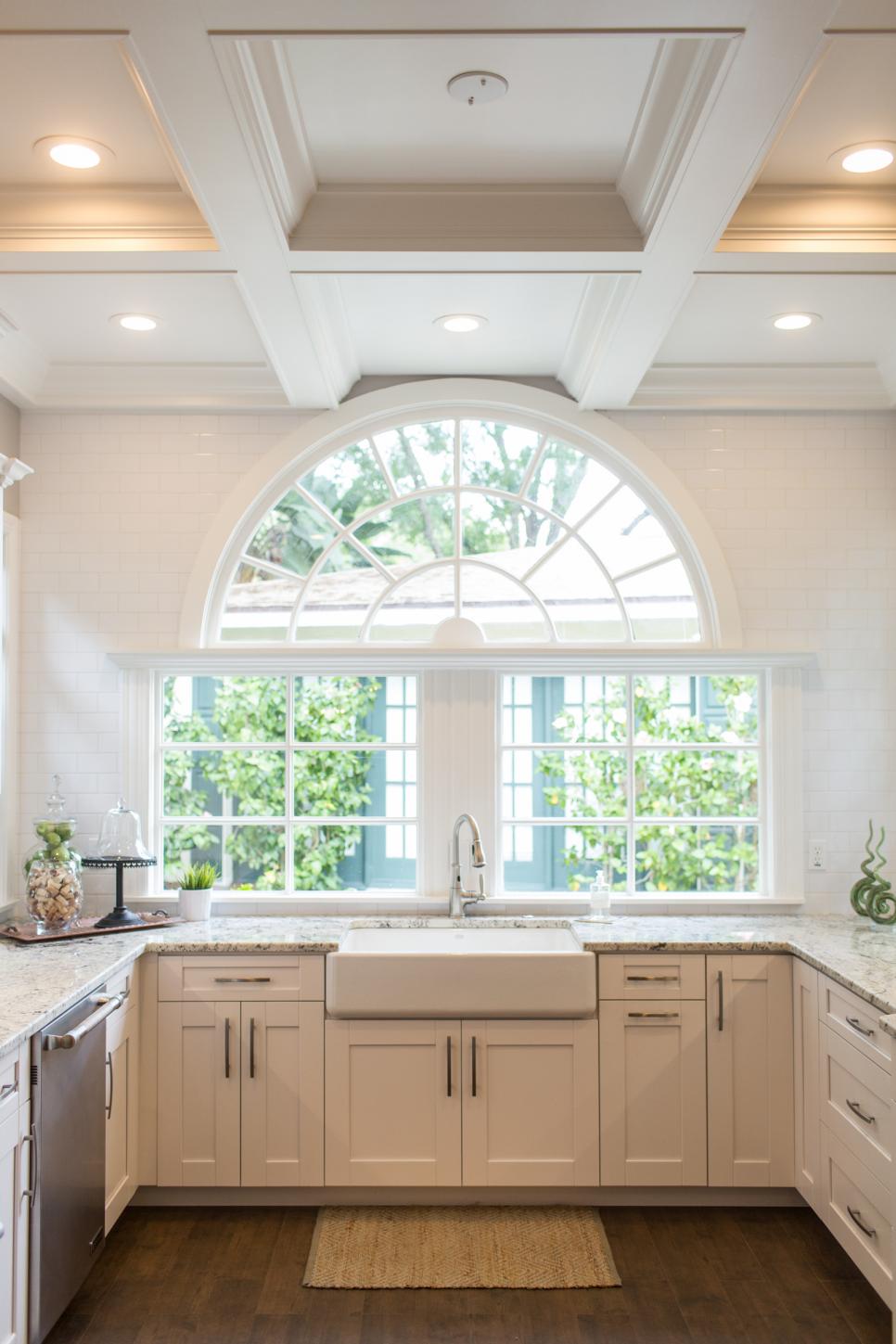 Clean White Kitchen Features Farmhouse Sink & Stunning ...