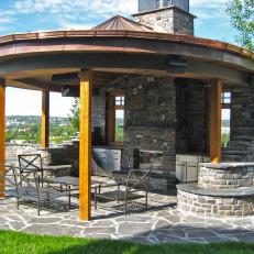 Curved Flagstone Patio Creates Outdoor Living Room