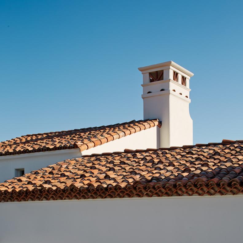 Mediterranean Home with Traditional Terra Cotta Roof, White Stucco 