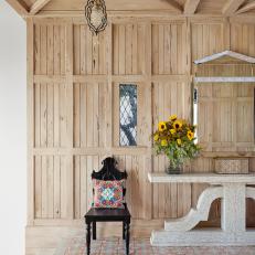 Mediterranean Entry with a Barn-Style Wall