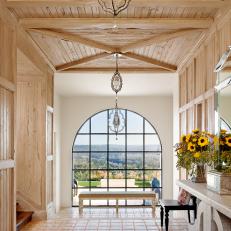Mediterranean Foyer with Rustic Touch