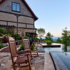 Rustic Patio Features Rocking Chairs & Infinity Pool