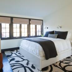 Black and White Transitional Bedroom With Rug