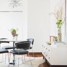 Chic Dining Area With Modern Black and White Dining Set