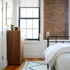 Loft Bedroom Boasts Chic Black and White Color Scheme