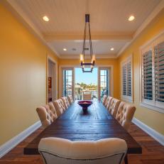Tropical Dining Room With Sunny Yellow Walls