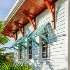 Island-Style Home Boasts Blue Bahama Shutters