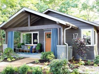 Classic bungalow appeal with a modern twist and thoughtful landscaping gives this home a contemporary look that sets the stage for the rest of the home’s urban style. “The bungalow lifestyle is set back into nature and it’s cozy,” says interior designer Brian Patrick Flynn.