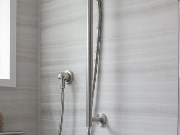 uo2015_master bathroom interior shower head faucet tile grey_vjpgrendhgtvcom616462jpeg