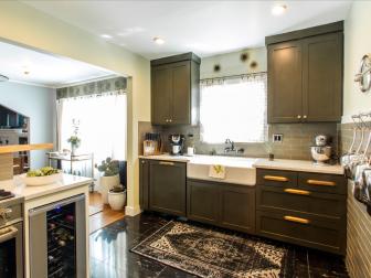 Updated Design with Dark Gray Cabinets and Gold Hardware