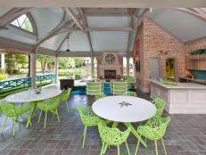 Outdoor Living Space With Lime Green Chairs & Kitchen