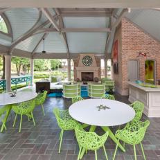 Outdoor Living Area Features Kitchen & Ample Dining Space