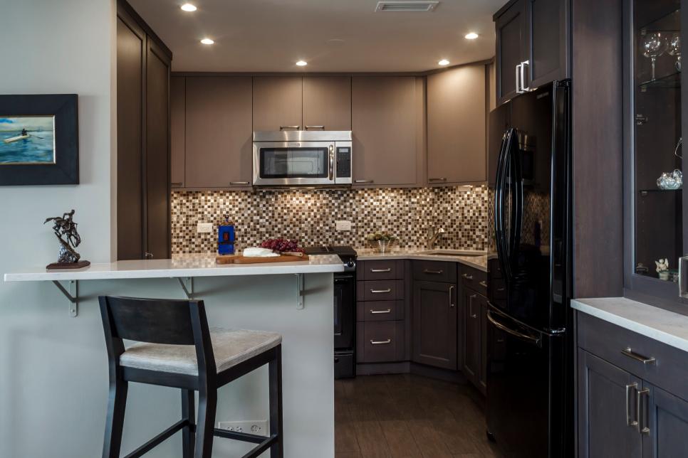 Small Contemporary Kitchen With Tile Backsplash And Dark Wood Cabinets