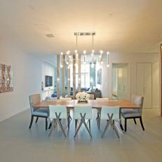 Neutral Modern Dining Room With Chandelier