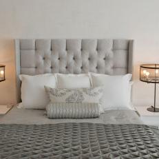 Gray Upholstered Bed and Nightstands